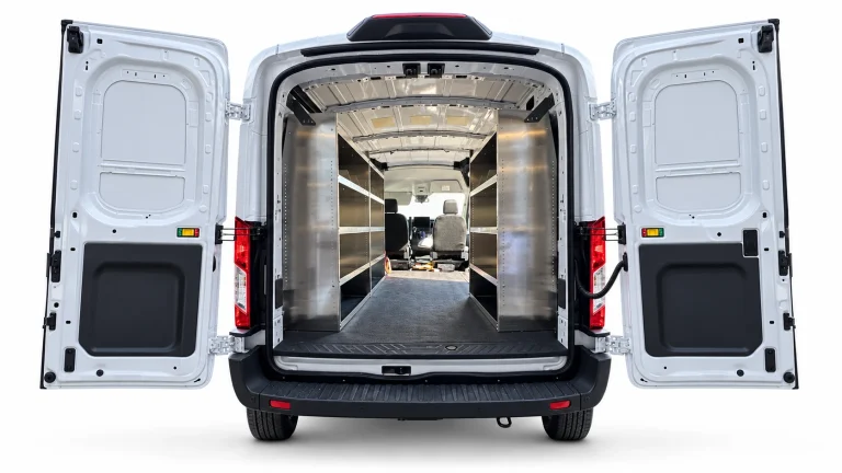 Ford Transit aluminum shelving set of 3 installed with two driver-side units and one passenger-side unit, viewed through the open rear doors