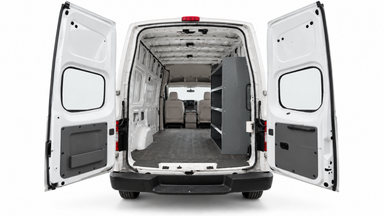 Nissan NV Cargo steel shelving unit on the passenger side, viewed through the open rear doors of a High Roof van.